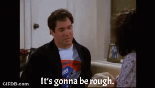 A Man Is Sitting On A Couch Talking To A Woman And Says `` It 'S Gonna Be Rough . '' GIF