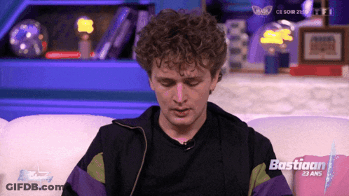 Man Sitting On Couch With Bastiaan 23 Ans Pillow GIF