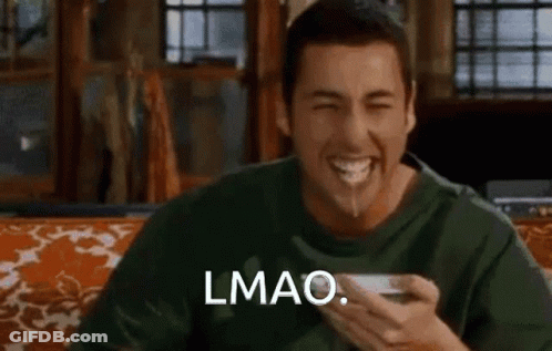 A Man Is Sitting On A Couch With A Bowl Of Food In His Mouth And Says Lmao . GIF