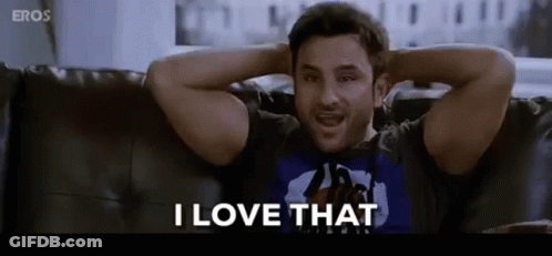 A Man Is Sitting On A Couch With His Hands Behind His Head Saying I Love That . GIF