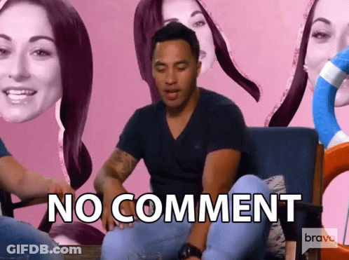 A Man Is Sitting On A Couch With The Word No Comment Written On The Bottom GIF