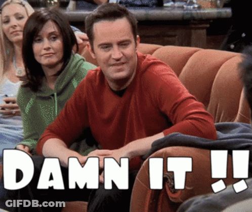 A Man Is Sitting On A Couch With The Words Damn It Written On The Bottom GIF
