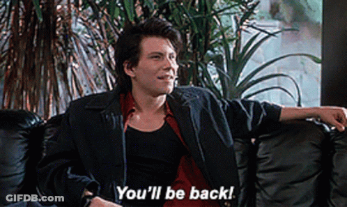 A Man Is Sitting On A Couch With The Words You 'Ll Be Back GIF