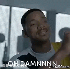 A Man Is Smiling And Giving A Thumbs Up With The Words `` Oh Damnnn '' Written Below Him . GIF