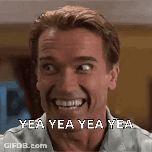 A Man Is Smiling And Making A Funny Face With The Words Yea Yea Yea Yea Written Below Him . GIF