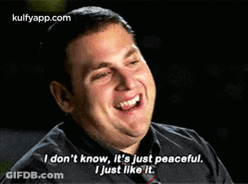 A Man Is Smiling And Saying I Don T Know , It 'S Just Peaceful . GIF