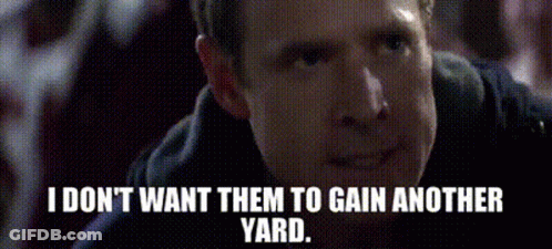 A Man Is Smiling And Saying I Don T Want Them To Gain Another Yard . GIF