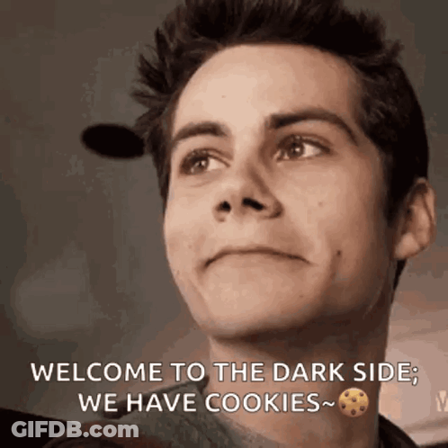 A Man Is Smiling And Saying Welcome To The Dark Side We Have Cookies .. GIF