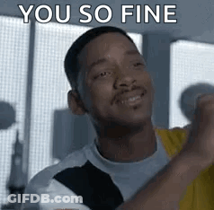 A Man Is Smiling And Saying `` You So Fine '' While Holding His Fist Up In The Air . GIF
