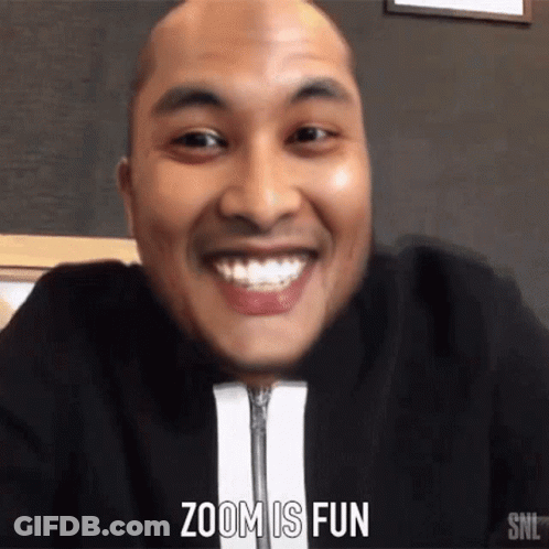 A Man Is Smiling And The Words Zoom Is Fun Are Visible GIF