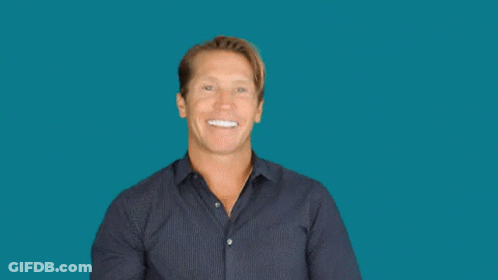 A Man Is Smiling And Waving With The Words Swoosh Above Him GIF
