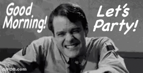A Man Is Smiling In A Black And White Photo With The Words Good Morning Let 'S Party GIF