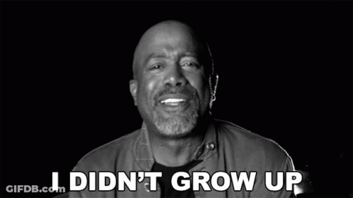 A Man Is Smiling In A Black And White Photo With The Words In A Castle Above Him GIF