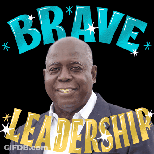 A Man Is Smiling In Front Of The Word Brave Leadership GIF