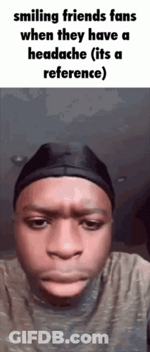 A Man Is Smiling When They Have A Headache And It 'S A Reference . GIF