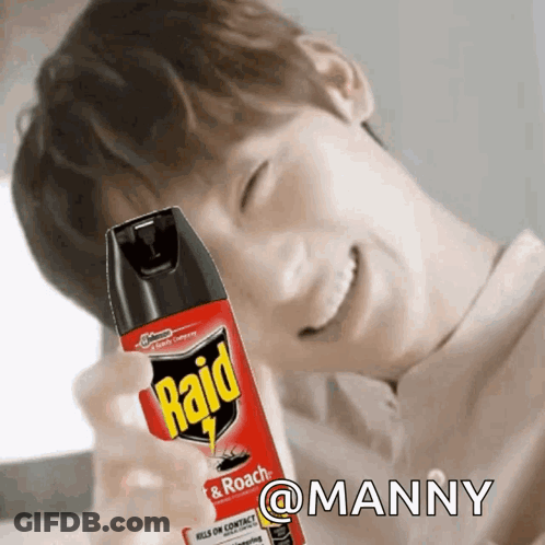 A Man Is Smiling While Holding A Raid Insect Spray GIF