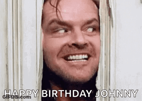 A Man Is Smiling While Looking Through A Window And Says `` Happy Birthday Johnny '' . GIF