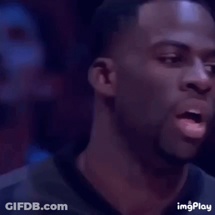 A Man Is Smiling With His Eyes Closed . GIF