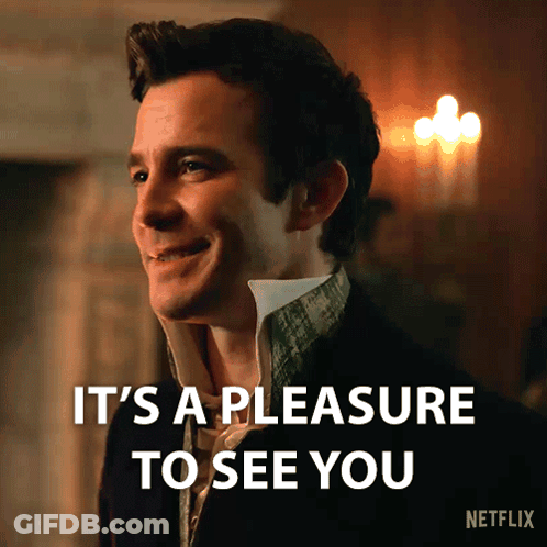 A Man Is Smiling With The Words " It 'S A Pleasure To See You " Next To Him GIF