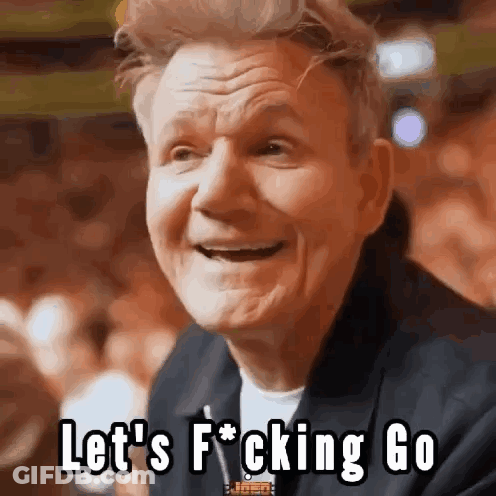 A Man Is Smiling With The Words Let 'S F * Cking Go On His Face GIF