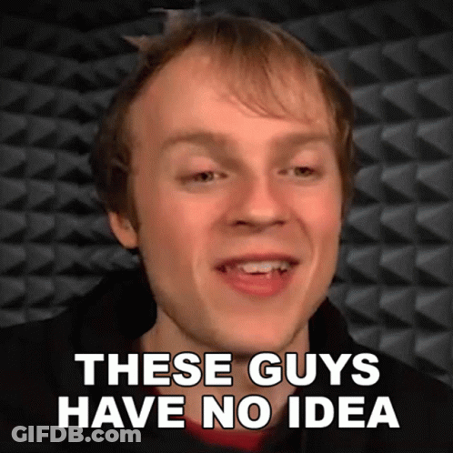A Man Is Smiling With The Words These Guys Have No Idea Below Him GIF
