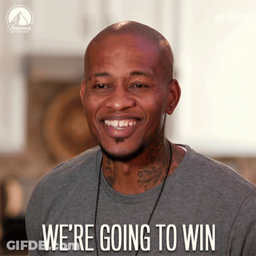 A Man Is Smiling With The Words " We 'Re Going To Win " Below Him GIF