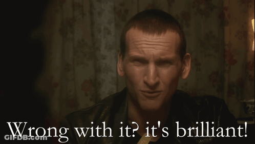 A Man Is Smiling With The Words Wrong With It It 'S Brilliant Below Him GIF