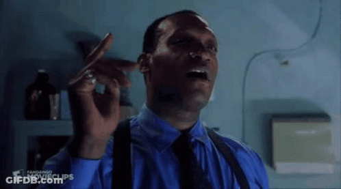 A Man Is Smoking A Cigarette And Saying `` I See You Soon !!! '' . GIF