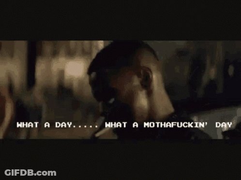 A Man Is Smoking A Cigarette And Says What A Day What A Mothafuckin Day GIF
