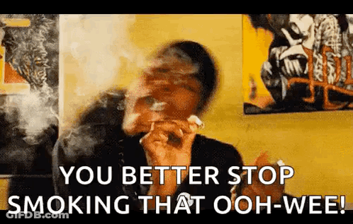 A Man Is Smoking A Cigarette And The Words `` You Better Stop Smoking That Ooh-Wee '' Are Visible . GIF