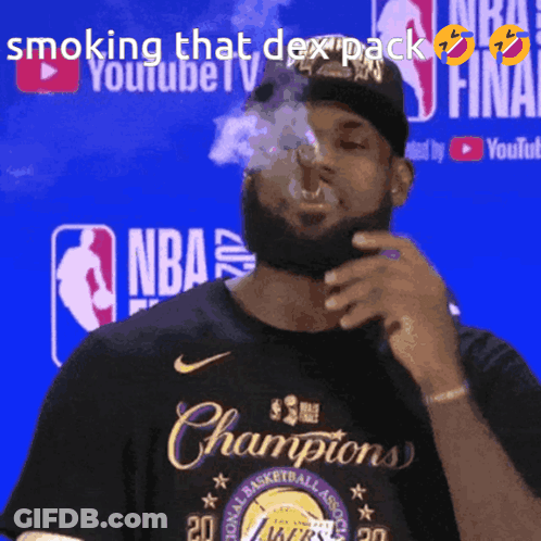 A Man Is Smoking A Cigarette In Front Of A Youtube Logo GIF