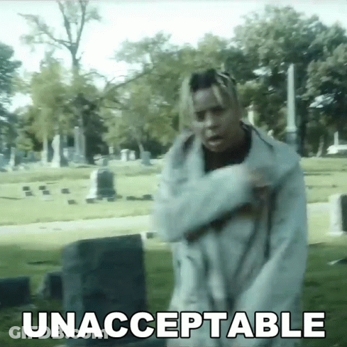 Man Standing In Cemetery Unacceptable Word GIF
