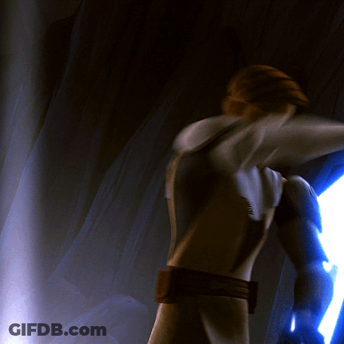 A Man Is Standing In A Dark Room With A Light Shining Through The Curtains GIF