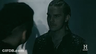 A Man Is Standing In A Dark Room With A Shadow Of A Woman Behind Him And The Word History On The Bottom . GIF