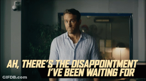 A Man Is Standing In A Dark Room With The Words Ah There 'S The Disappointment I 'Ve Been Waiting For GIF