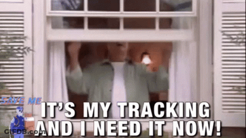 A Man Is Standing In A Doorway With The Words It 'S My Tracking And I Need It Now . GIF