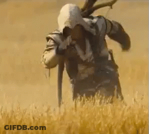 Man Holding Knife In Wheat Field GIF