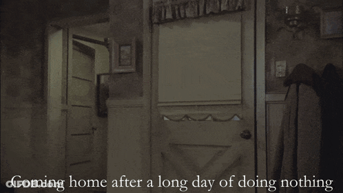 A Man Is Standing In A Kitchen With The Words Coming Home After A Long Day Of Doing Nothing Below Him GIF