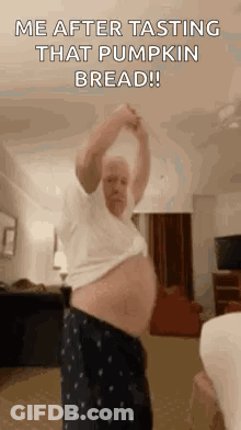 Man Standing In Living Room With Arms Out GIF