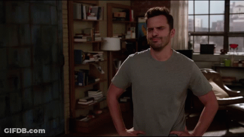 A Man Is Standing In A Living Room With The Words That Sounds Fishy On The Screen GIF