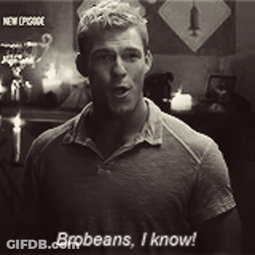 A Man Is Standing In A Room Talking To Someone And Says Brobeans , I Know . GIF