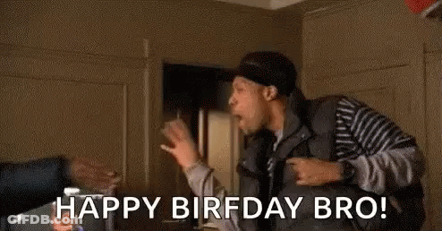 A Man Is Standing In A Room With A Red Balloon In The Background And Says `` Happy Birfday Bro ! '' GIF