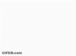 A Man Is Standing In A Room With His Arms Outstretched And Looking Up At The Sky . GIF