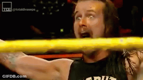 Wrestling Man With Mouth Open And Outstretched Arm GIF