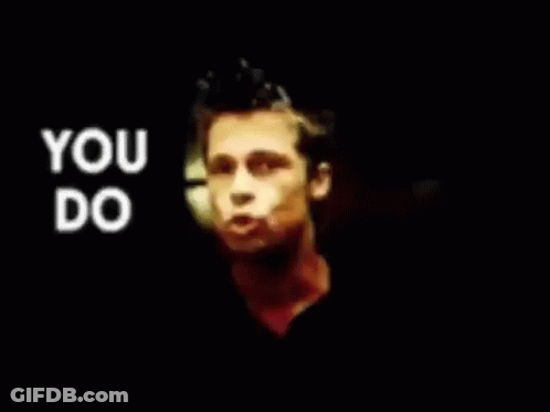A Man Is Standing In Front Of A Black Background With The Words `` You Do Not '' Written In White Letters . GIF