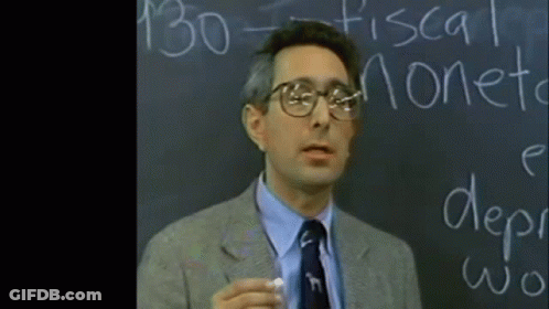 A Man Is Standing In Front Of A Blackboard That Says 130 Fiscal Moneta GIF