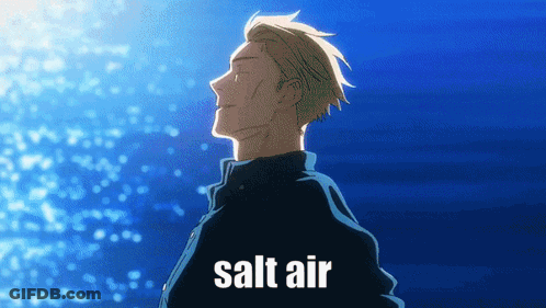A Man Is Standing In Front Of A Blue Background With The Words Salt Air Written On The Bottom GIF