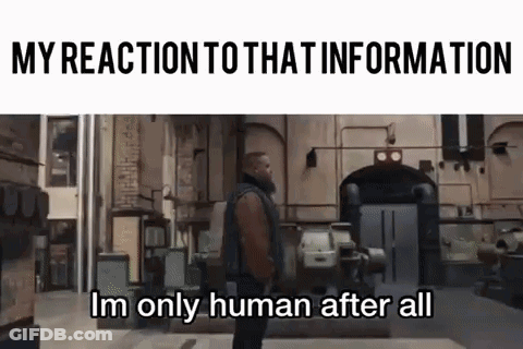 A Man Is Standing In Front Of A Building With The Words `` My Reaction To That Information Im Only Human After All '' Wr GIF
