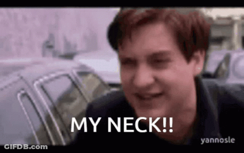 A Man Is Standing In Front Of A Car And Saying `` My Neck ! '' GIF