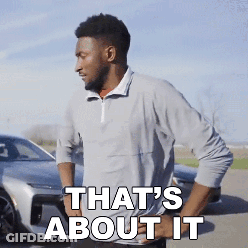 A Man Is Standing In Front Of A Car With His Hands On His Hips And Says That 'S About It . GIF